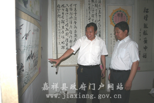 我县庆祝建党90周年“我心中的红太阳九十丰碑”书画展开展 